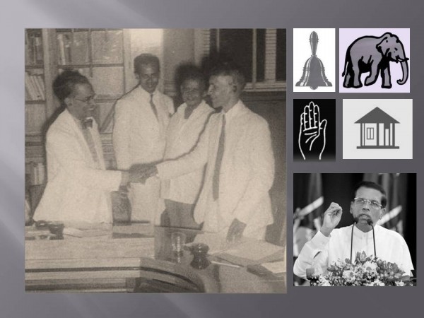 PRIME MINISTER S.W.R.D. Bandaranaike (left) and S.J.V. Chelvanayagam, leader of the Thamil Arasu Katchi, shake hands after signing what came to be known as the Bandaranaike-Chelvanayagam Pact on July 26, 1957 (pic via: The Hindu ~ Also in pic: Symbols of JVP, UNP, SLFP & ITAK; and President Maithripala Sirisena