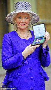 Angela Kelly, the Queen's Curator for 'Jewellery, Insignia and Wardrobe', has developed a very close relationship with Her Majesty (Mrs Kelly pictured receiving the Royal Victoria Order Investitures at Buckingham Palace)-DailyMail on Facebook